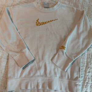 Nike White Crewneck Sweatshirt with Gold Floral Swoosh